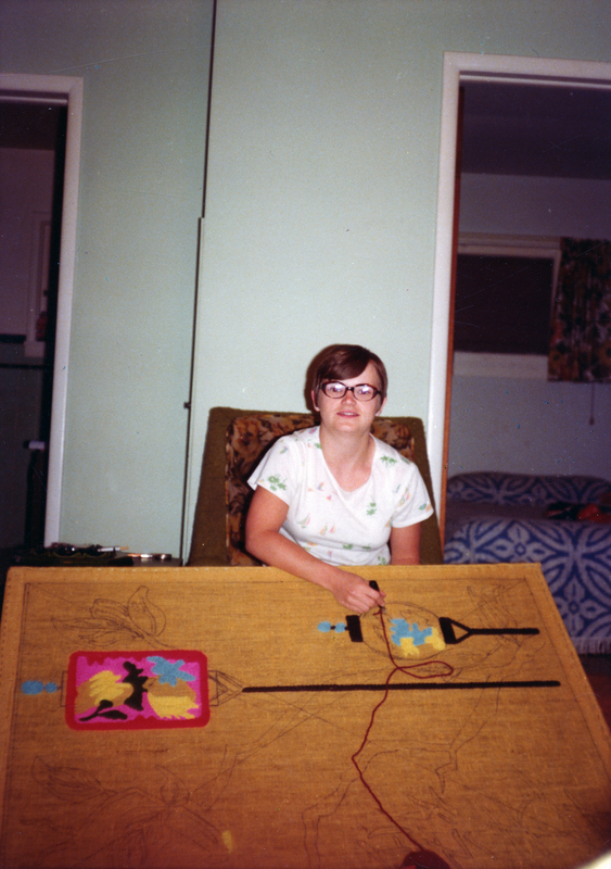 Color photograph of Vicki Mitchell working on an embroidery project.