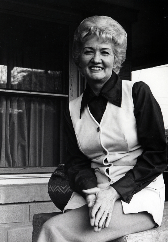 Photograph of Alice Ruth Pruitt seated, smiling at the camera.