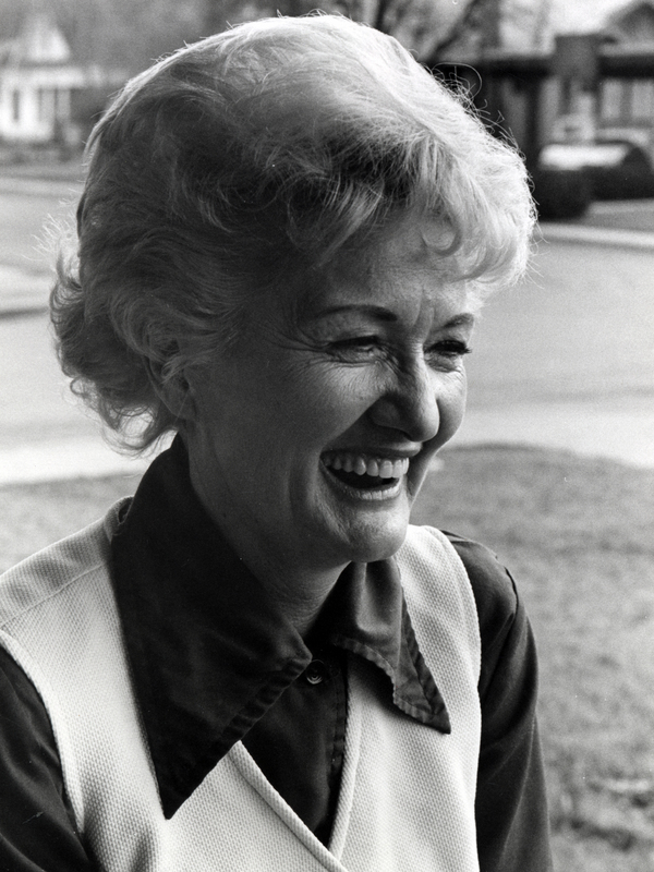 Photograph of Alice Ruth Pruitt outside, smiling away from the camera.