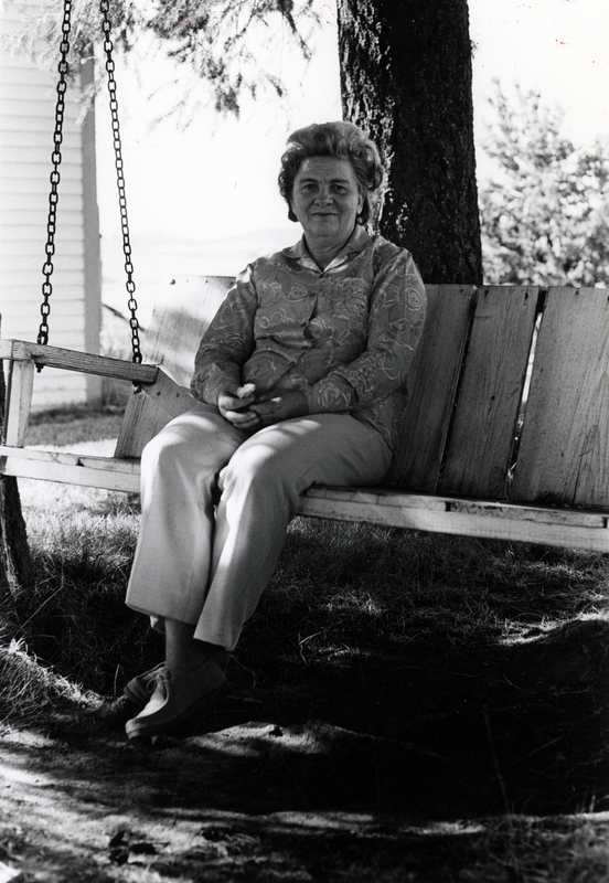 Photograph of Mary Alice Brock sitting outside, smiling at the camera.
