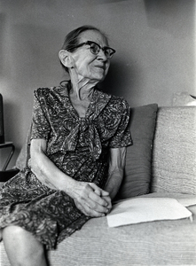 Photograph of Millie (Martha) Burroughs sitting, looking away from the camera.