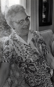 Photograph of Blanche Thiessen seated, smiling away from the camera