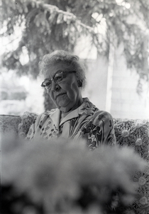 Photograph of Blanche Thiessen seated, looking away from the camera