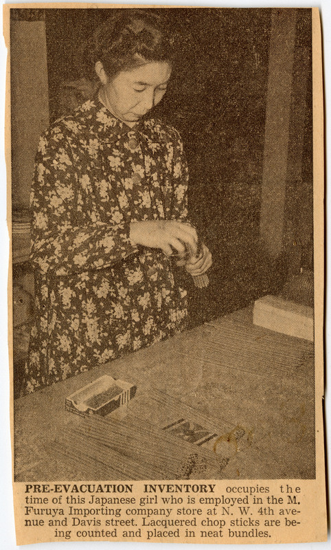 Newspaper clipping from Oregon Journal showing a woman inventorying chopsticks in the M. Furuya Importing company store in Portland, OR.