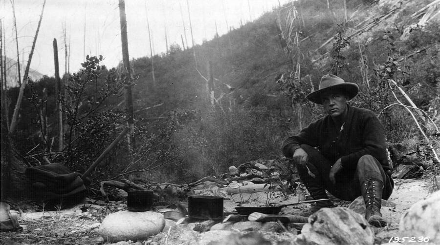 An Idaho forest ranger at breakfast, Selway National Forest, Jefferson, F. J., 1925