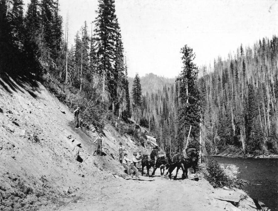 Clearing a slide from Lochsa Road, Selway National Forest, Swan, K.D., 1925