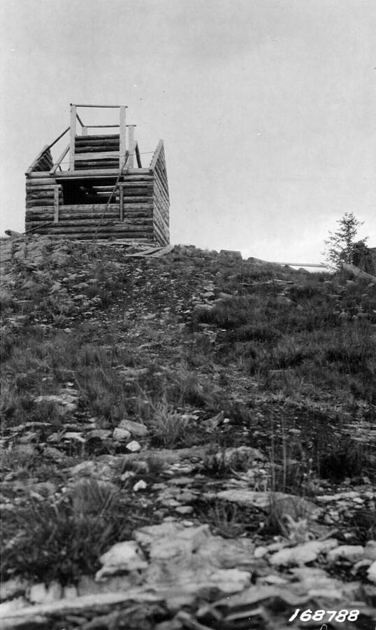 Lookout cabin under construction on Nez Perce Peak, Flint, Howard, 1922-08-01
