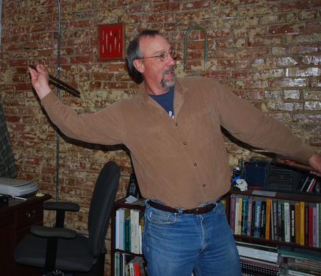 Matt Root demonstrating throwing technique using a reproduction of a Native American spear. Photo courtesy of Debbie Lee