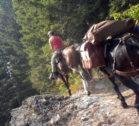 Anna Bengtson riding in toward Moose Creek.