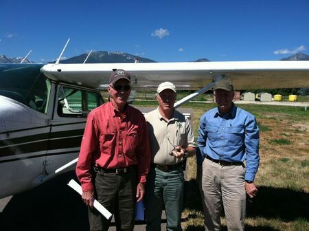 Celebrating 40th Anniversary of free-burning fires in Selway Country: Bob Mutch, Ranger Dave Campbell, author Steve Pyne, following an overflight of the wilderness.