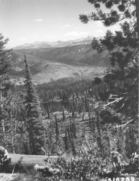 AW Blackerby. 1957. Nez Perce National Forest. Water scenes - Papoose Lake in the Selway-Bitterroot Wilderness, Moose Creek District. Trail 430, one mile south of Freeman Peak Lookout; El Capitan, tallest peak on skyline.