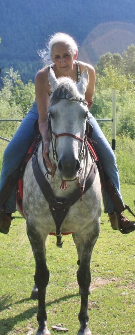 Mary on her gray mare in Missoula