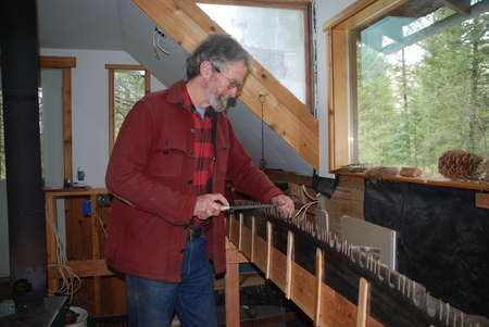 Warren at the "saw shack" sharpening a crosscut saw