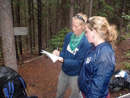 Teaching volunteers how to do a sign inventory on Lolo Peak trail.