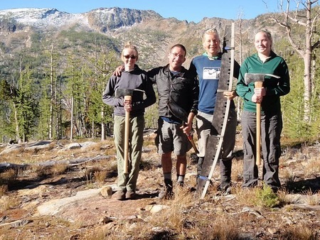 Rob Mason with the MWA Ridgerunner volunteers at south One Horse Lake, at the foot of Lolo Peak