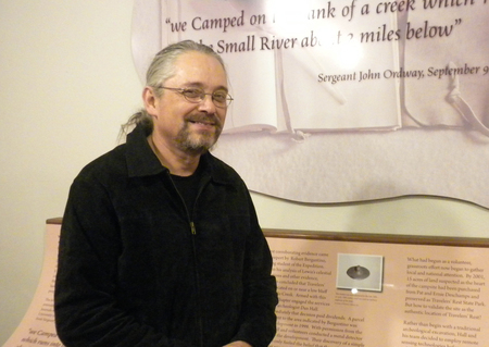 Vernon Carroll in Traveler's Rest Museum, standing next to a quote from the Lewis and Clark journals. Photo courtesy Debbie Lee
