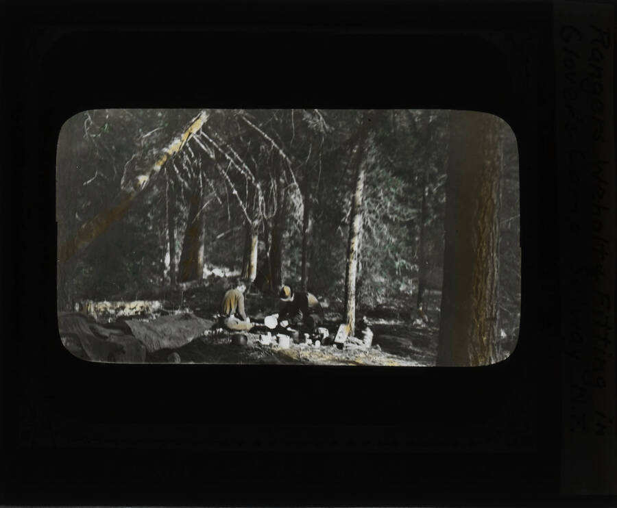 The glass slide reads: 'Rangers Weholt and Fitting in Glover's Camp. Selway N.F.'