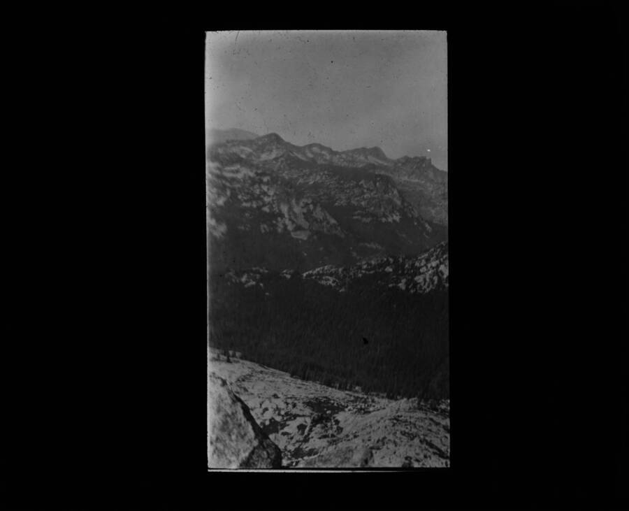 The glass slide reads: 'Blodgett Pass and Canyon, Bitterroot Mountains.'