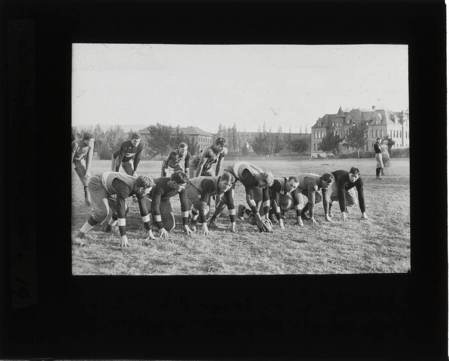 The glass slide reads: 'Idaho football team, 1908.'