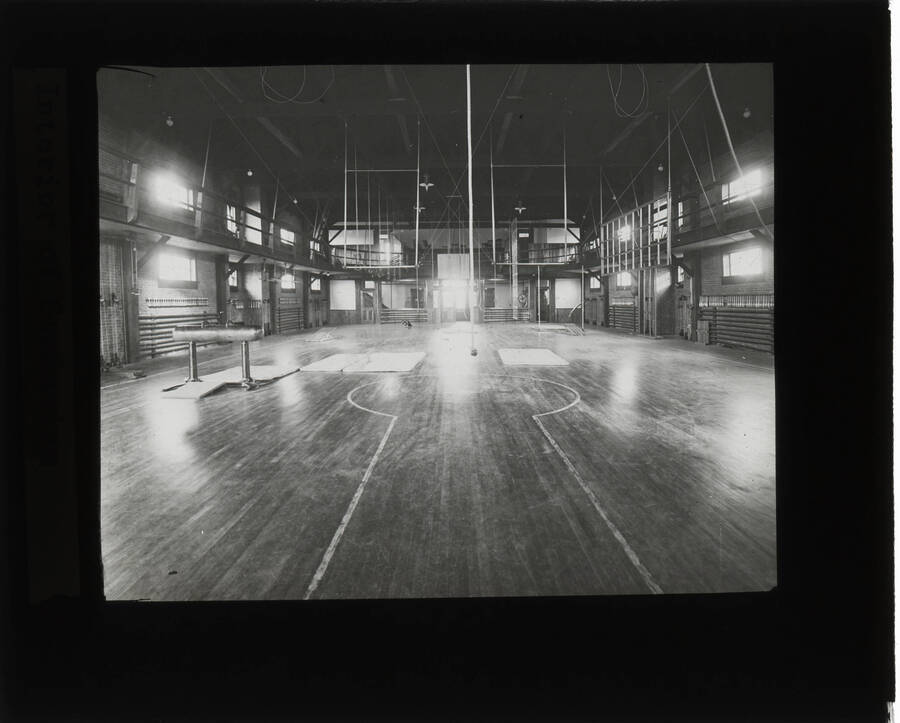 The glass slide reads: 'Interior of Gymnasium.'