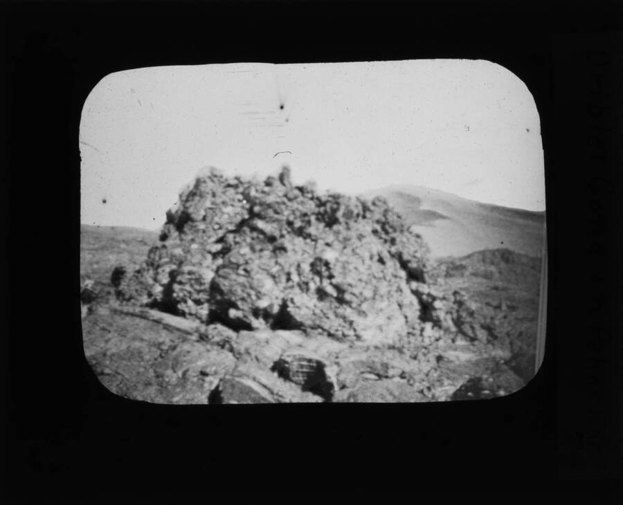 The glass slide reads: 'Driblet cone in pahoehoe.'