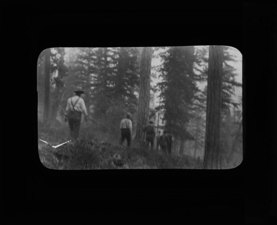 The glass slide reads: 'Going to fire at Lolo Hot Springs, Montana.'