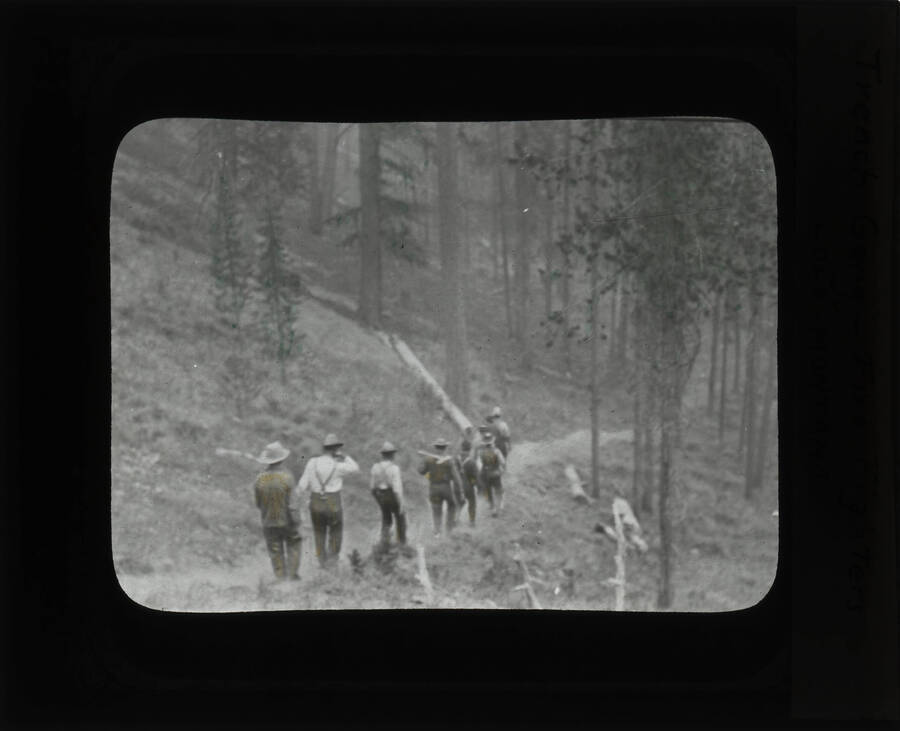 The glass slide reads: 'Trench gang, Firefighters, Lolo, Montana.'