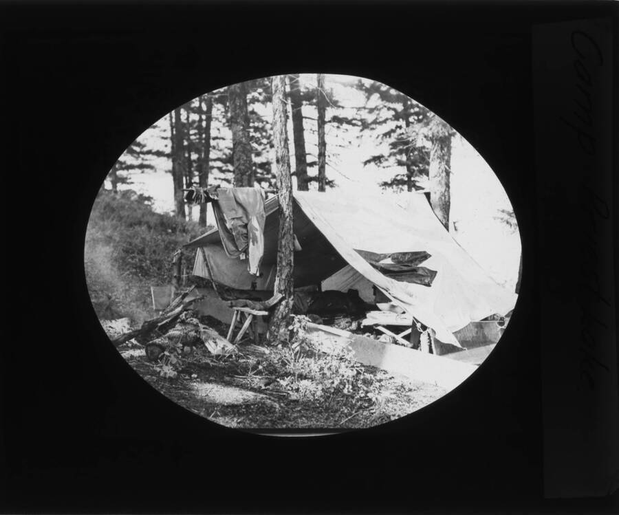The glass slide reads: 'Camp site near Priest Lake.'