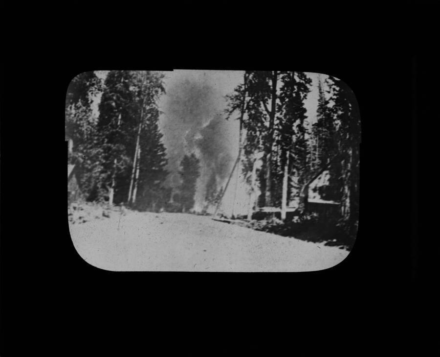 The glass slide reads: 'Fire that burned Avery, 1910.'