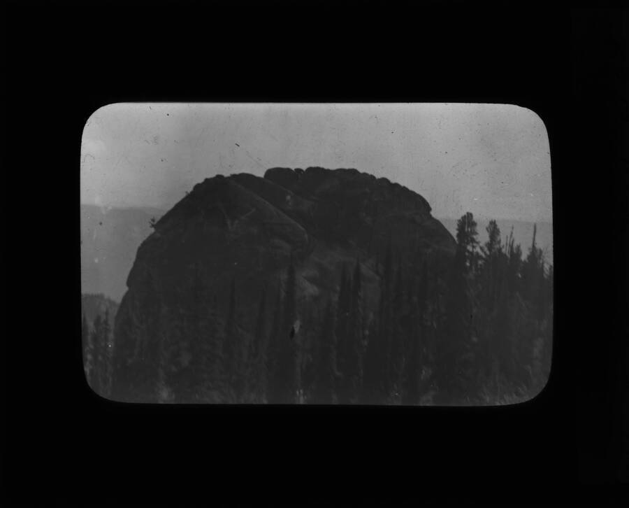The glass slide reads: '62 Rock, 62 Camp, Selway National Forest.'