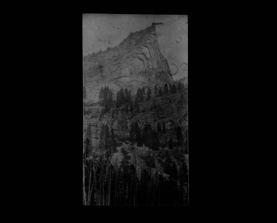 The glass slide reads: 'Needle Peak, Blodgett Canyon.'
