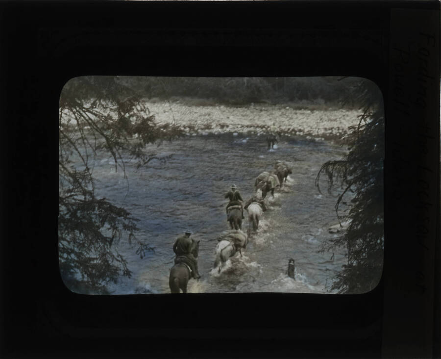 The glass slide reads: 'Fording the Lochsaw at Powell - Idaho.'