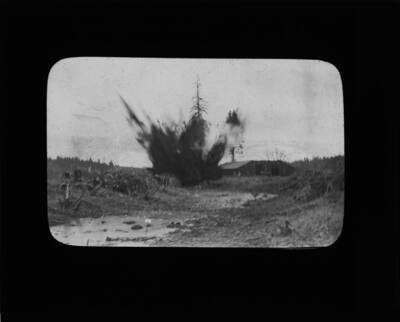 The glass slide reads: 'Forty one lbs. of dynamite removing 14 stumps averaging 20 inches. Fig. 11. Plot I.'