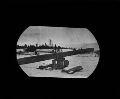 The glass slide reads: 'Capstan type of stump puller.'