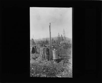 The glass slide reads: 'Near view of one of the earlier forms of condenser.'