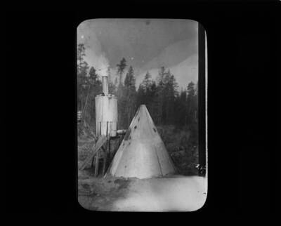 The glass slide reads: 'The best form of Hood and Condenser. Bull. 91.'