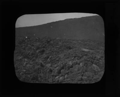 The glass slide reads: 'Near view of "aa" surface.'.