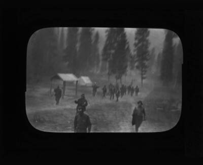 The glass slide reads: 'Fire fighting crew which saved Lolo Hot Springs.'