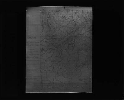 The glass slide reads: 'Firefighters' map showing contours, Idaho Mts.'