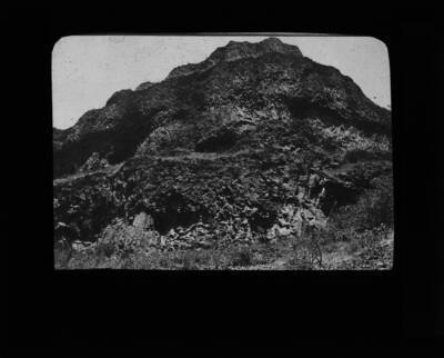 The glass slide reads: 'Penny lava bluffs, Kooskia, Idaho.'
