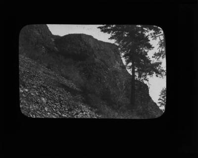 The glass slide reads: 'Penny lava bluffs, Kooskia, Idaho.'