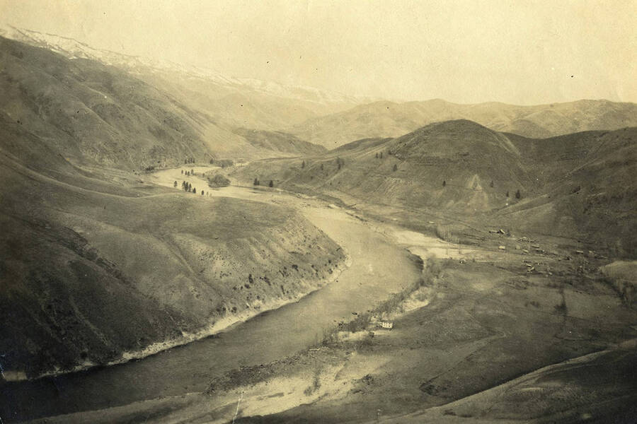 Looking north at Slate Creek on the Salmon River. Homes and buildings can be seen in the distance.