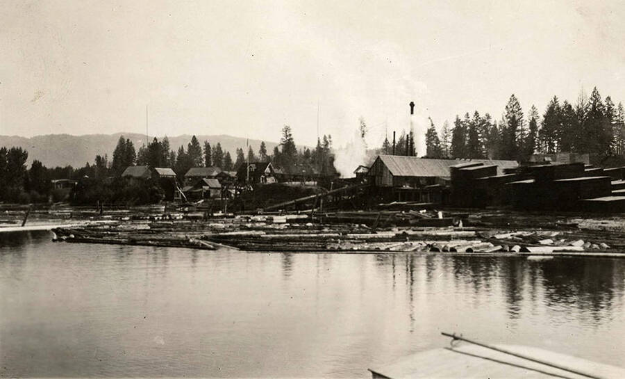 Sawmill out buildings sit along side Payette Lake near McCall.
