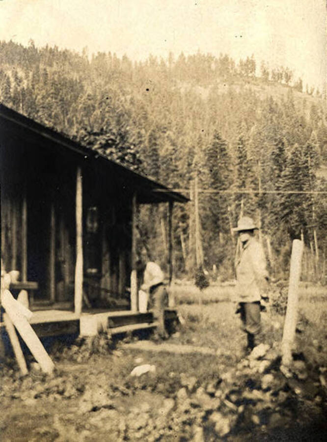 Two men work on constructing an out building at the Stonebraker Ranch.