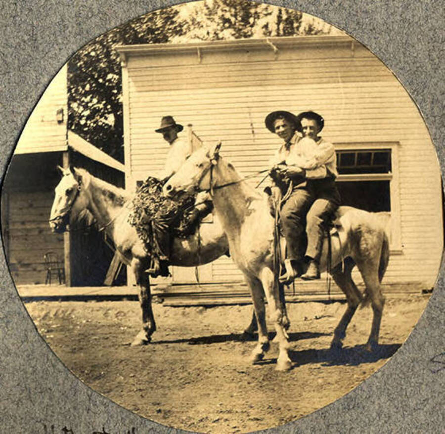 Nate, "Governor" (Sumner Stonebraker), and "Teddy" pose on horses.