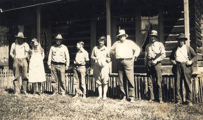 From left to right: W. A.(Al) Stonebraker and wife Golda, Sumner Stonebraker, Adolph Stonebraker, Mrs. and Mr. Summerland, Mr. Ely, Mr. Hines (mining cook). Negative for print identifier PG26-PO-54.
