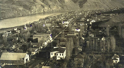 Unstamped postcard with handwritten note that reads: 'We have marked a few buildings here. They are numbered and I will name them: #1 is new schoolhouse, #2 is old schoolhouse, #3 is Presbyterian Church, #4 is our place above Presbyterian Church, #5 is Courthouse. How is housekeeping? Do you make the office? This is from Mrs. G. Stonebraker.'