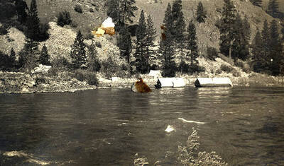 Camping along the riverbank.