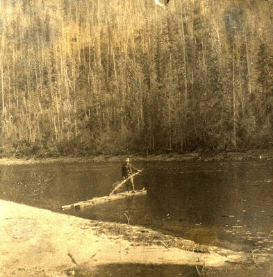 Allen Stonebraker stands on a makeshift raft on the Middle Fork of the Payette River.