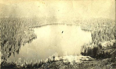 Overlook of a lake near Sheepeater Lake region.
